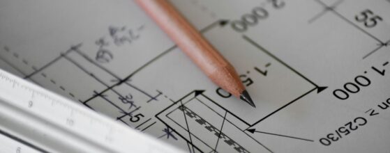 Pencil on architectural drawings — detailed building plans