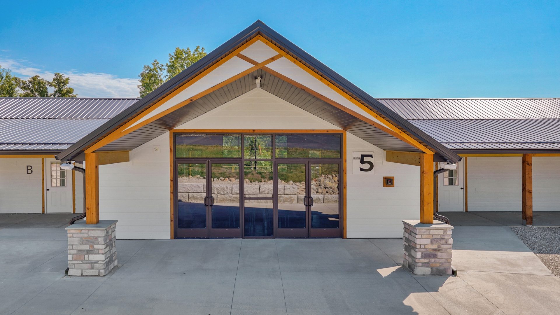 Gabled entrance of building 5 at Crosspointe Camp in Rocky Mount, MO