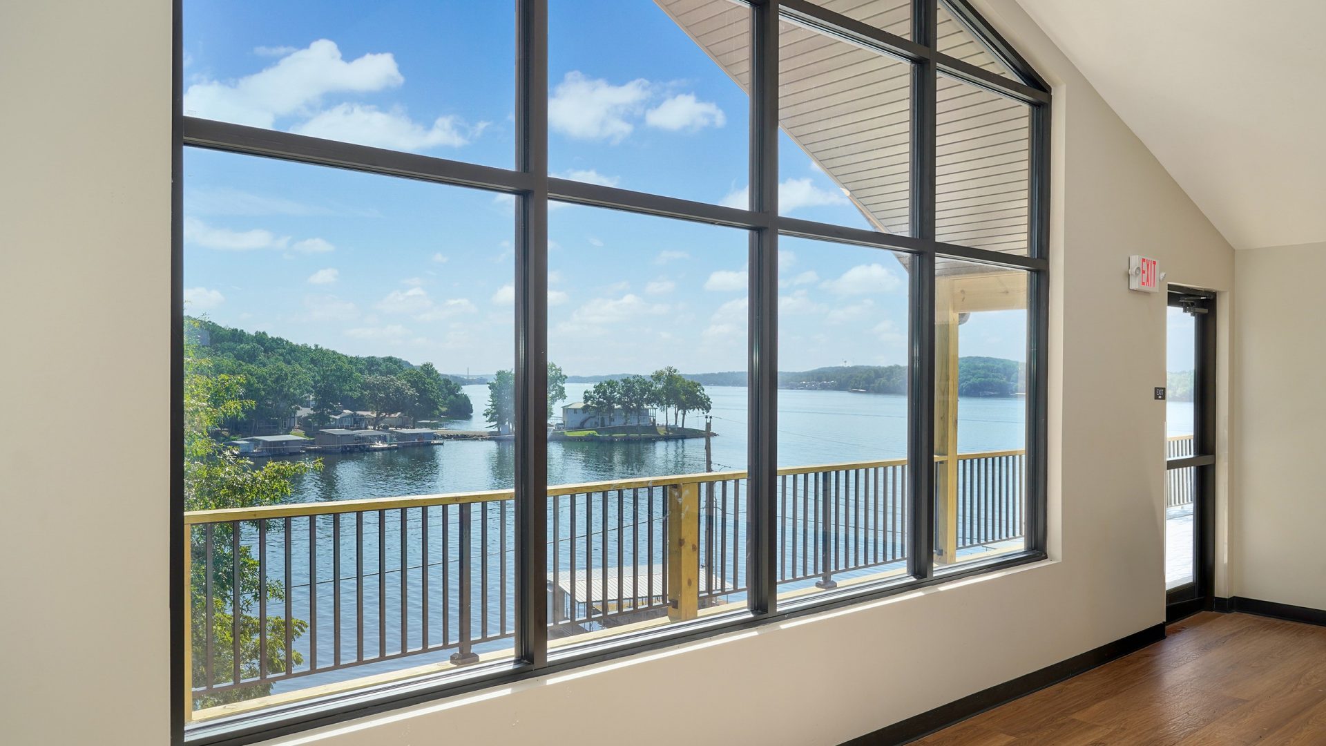 Interior of Crosspointe Camp with large windows overlooking Lake of the Ozarks