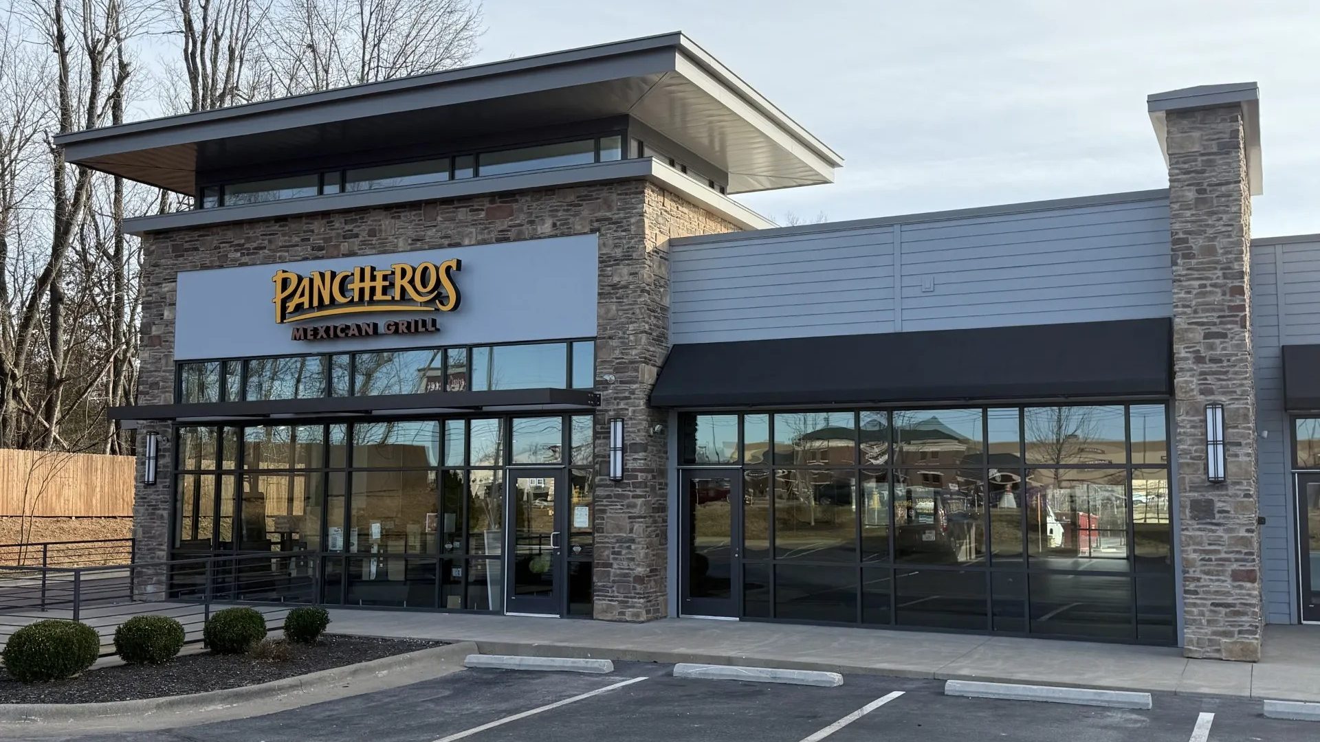 Exterior of Pancheros Mexican Grill storefront in Springfield MO with stone facade
