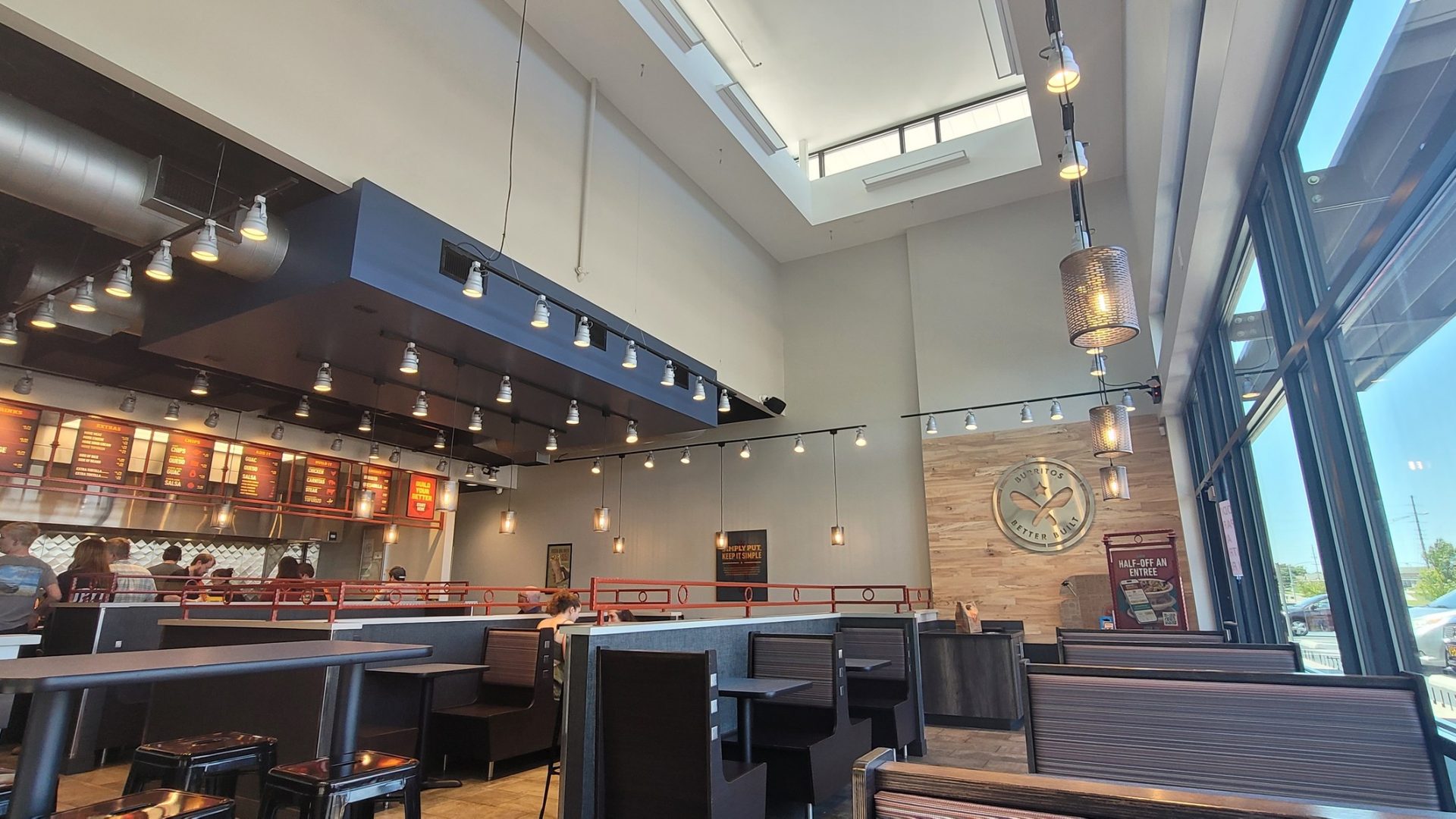 Interior dining room of Pancheros Mexican Grill in Springfield MO with pendant lights and booths