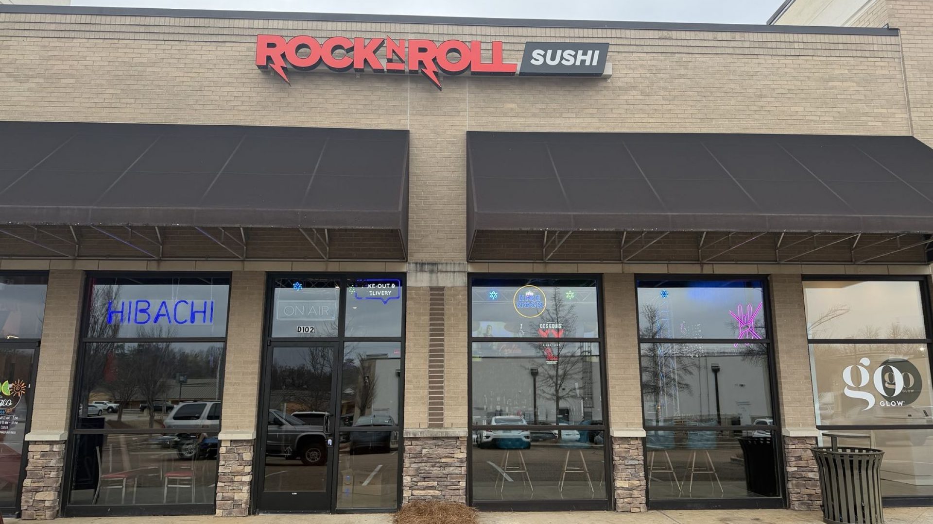 Storefront exterior of Rock N Roll Sushi in Oxford, MS on an overcast day
